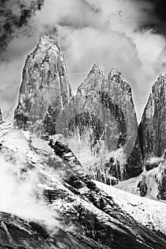 Torres del Paine peaks coming from clouds