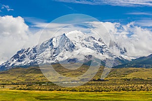 Torres del Paine peaks coming from clouds