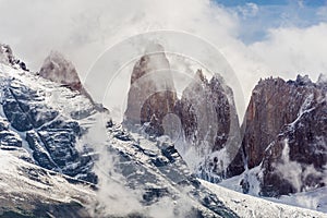 Torres del Paine peaks coming from clouds