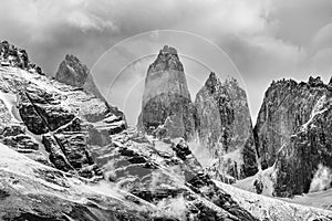 Torres del Paine peaks coming from clouds