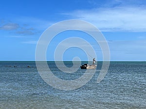 Torres Strait Islander fisherman fishing