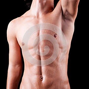 Torso of a sweat man in topless photo