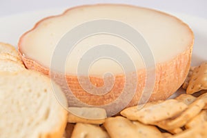 Torta del Casar cheese with reganas and toasts photo