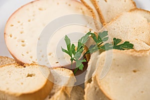 Torta del Casar cheese with slices of toasted bread photo