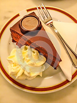 Torte, a rich, multilayered, cake that is filled with whipped cream photo