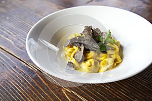 Tortellini with black truffle