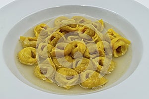 Tortellini in brodo tortellini in broth. Traditional italian cuisine. photo