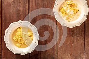 Tortellini with broth and cream sauce, Italian food, shot from the top