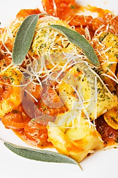 Tortellini pasta in basilico sauce