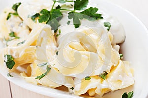 Tortellini pasta in cheese sauce