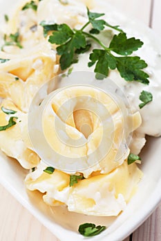 Tortellini pasta in cheese sauce