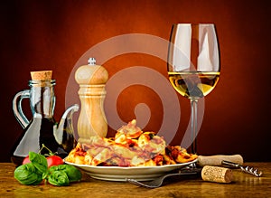 Tortellini pasta meal and white wine