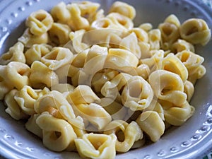 Tortellini pasta on a plate.