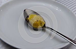 Tortellino in brodo broth in a white plate, italian emilia-romagna pasta photo