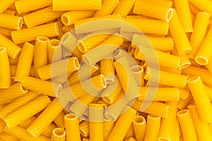 Tortiglioni pasta background texture