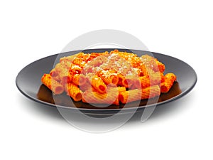 Tortiglioni pasta with tomato sauce isolated on white background