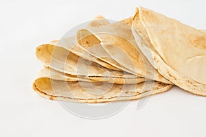 Tortilla, cakes made of wheat flour on white background