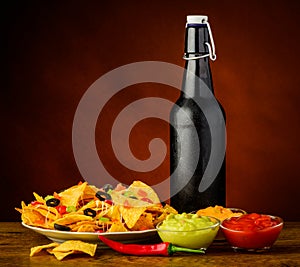 Tortilla chips, dip and beer