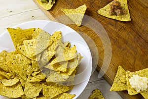 Tortilla chips with guacamole and salsa dips