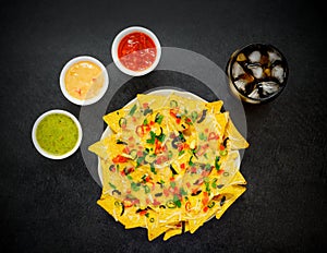 Tortilla Chips with Guacamole, Tomato and Cheese Dip and Cola