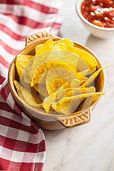 Tortilla chips and red tomato salsa dip. Mexican nacho chips