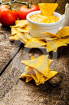 Tortilla chips with tomato and cheese-garlic dip