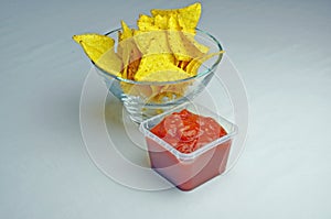 Tortilla crisps and salsa dip