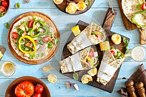 Tortilla with grilled chicken fillet, lager and grilled vegetables
