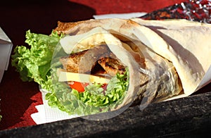 Tortilla roll with meat cheese and salad