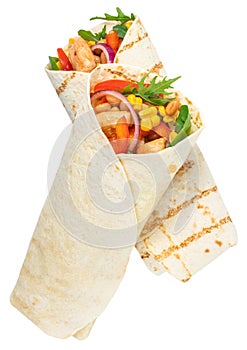 Tortilla wrap with fried chicken meat and vegetables isolated on white background