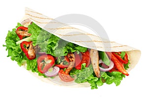 Tortilla wrap with fried chicken meat and vegetables isolated on white background. fast food