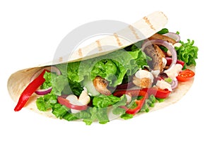 Tortilla wrap with fried chicken meat and vegetables isolated on white background. fast food