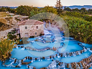 Toscane Italy, natural spa with waterfalls and hot springs at Saturnia thermal baths, Grosseto, Tuscany, Italy aerial