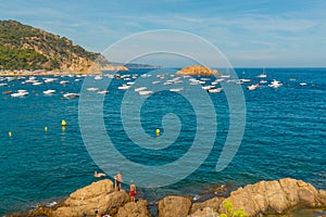 TOSSA DE MAR, CATALONIA, SPAIN: Seascape with ships, view of the fortress