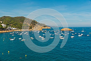 TOSSA DE MAR, CATALONIA, SPAIN: Seascape with ships, view of the fortress