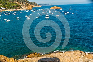 TOSSA DE MAR, CATALONIA, SPAIN: Seascape with ships, view of the fortress