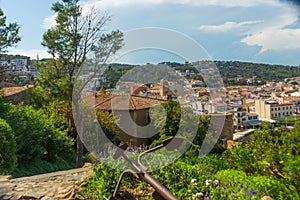 TOSSA DE MAR, SPAIN: The city walls of the old fortress of Tossa de Mar on a sunny day