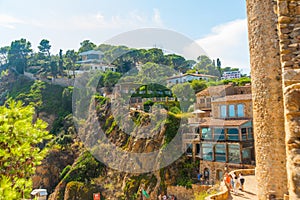 TOSSA DE MAR, SPAIN: The city walls of the old fortress of Tossa de Mar on a sunny day