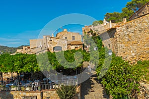 TOSSA DE MAR, SPAIN: The city walls of the old fortress of Tossa de Mar on a sunny day