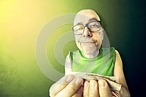 Tossic and relaxed man rolling herb