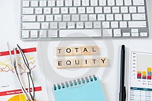 Total equity concept with letters