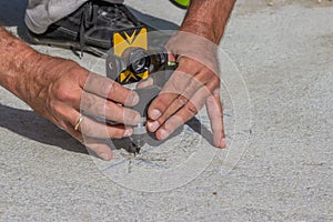 Total station prism with survey worker hands 2