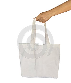 Tote bag canvas white cotton fabric cloth eco shopping sack mockup blank template isolated on White