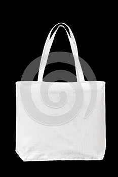 Tote bag canvas white cotton fabric cloth for shoulder eco shopping sack mockup blank template isolated on black background