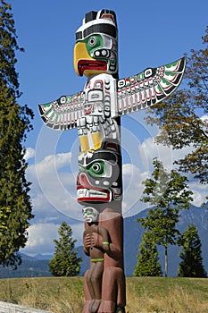Totem Pole in Vancouver, Canada photo