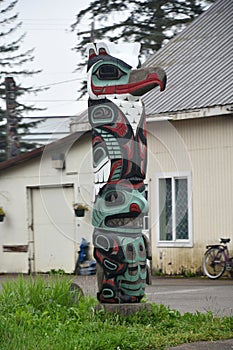 Totem Pole in the village of Hoonah at Icy Strait Point in Alaska photo