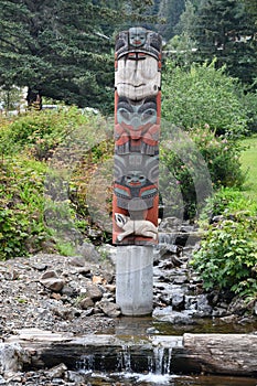 Totem Pole in the village of Hoonah at Icy Strait Point in Alaska photo