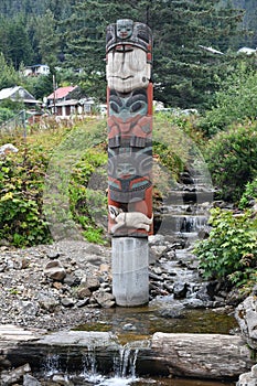 Totem Pole in the village of Hoonah at Icy Strait Point in Alaska photo