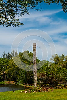 Totem pole with wood carvings. Kuching to Sarawak Culture village. Malaysia