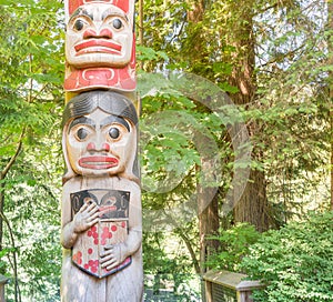 Indian totem poles in Capilano Suspension Bridge in Vancouver, C